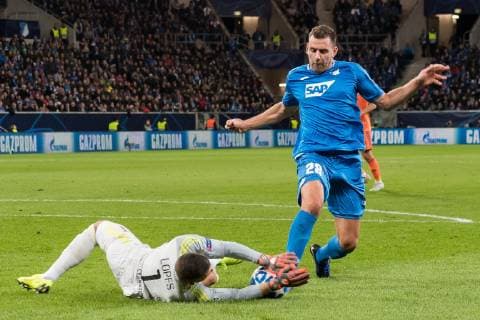 (L-R) goalkeeper Anthony Lopes of Olympique Lyonnais, Adam Szalai of TSG 1899 Hoffenheim during the UEFA Champions League group E match between TSG 1899 Hoffenheim and Olympique Lyonnais at Rhein-Neckar-Arena on October 23, 2018 in Sinsheim, Germany UEFA Champions League 2018 2019 xVIxVIxImagesx xGerritxvanxKeulenxIVx 12542335