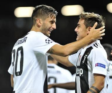Manchester United ManU v Juventus UEFA Champions League Paulo Dybala of Juventus celebrates scoring their first goal with team mate Rodrigo Bentancur (left) during the UEFA Champions League match at Old Trafford, Manchester Content Not Available For UK Newspapers Copyright: xStefanoxGnechx FIL-12450-0022