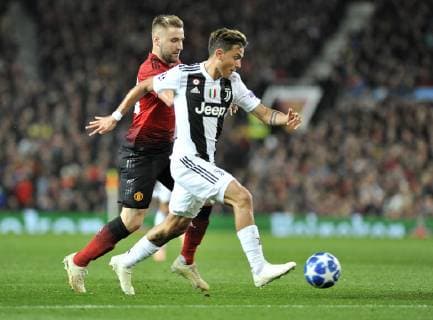 Manchester United ManU v Juventus UEFA Champions League Luke Shaw of Manchester United and Paulo Dybala of Juventus of Juventus during the UEFA Champions League match at Old Trafford, Manchester Content Not Available For UK Newspapers Copyright: xStefanoxGnechx FIL-12450-0036