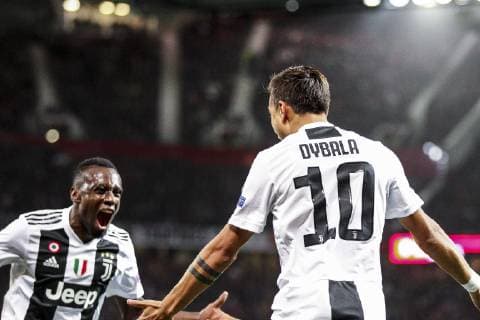 October 23, 2018 - Manchester, United Kingdom - Juventus forward PAULO DYBALA (10) celebrates with Juventus midfielder BLAISE MATUIDI (14) after scoring his goal during the Uefa Champions League Group Stage match at the Old Trafford in Manchester, England. UEFA Soccer 2018: Juventus 1:0 Manchester United ManU  - ZUMAn230 20181023_zaa_n230_464 Copyright: xMatteoxBottanellix