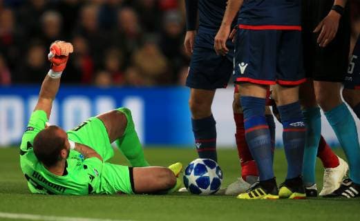 24th October 2018, Anfield, Liverpool, England; UEFA Champions League football, Liverpool versus Red Star Belgrade; Red Star Belgrade goalkeeper Milan Borjan suffers a shoulder injury after colliding with Mohamed Salah of Liverpool  ActionPlus12072937 DavidxBlunsden