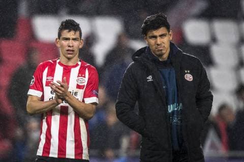 EINDHOVEN, PSV Eindhoven - Tottenham Hotspur FC 2-2, football, Champions League, season 2018-2019, 24-10-2018, Philips Stadium, slightly disappointed PSV player Hirving Lozano (L) and PSV player Erick Gutierrez (R) PSV - Tottenham Hotspur  x2564469x
