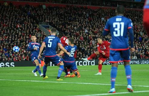 Liverpool s Roberto Firmino scores his teams first goal during the UEFA Champions League match at Anfield Stadium, Liverpool. Picture date 24th October 2018. Picture credit should read: Matt McNulty Sportimage EDITORIAL USE ONLY. No use with unauthorised audio, video, data, fixture lists, club league logos or live services. Online in-match use limited to 120 images, no video emulation. No use in betting, games or single club league player publications.