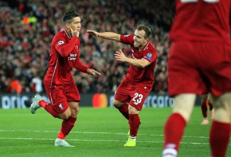 Liverpool s Roberto Firmino celebrates after scoring his teams first goal during the UEFA Champions League match at Anfield Stadium, Liverpool. Picture date 24th October 2018. Picture credit should read: Matt McNulty Sportimage EDITORIAL USE ONLY. No use with unauthorised audio, video, data, fixture lists, club league logos or live services. Online in-match use limited to 120 images, no video emulation. No use in betting, games or single club league player publications.