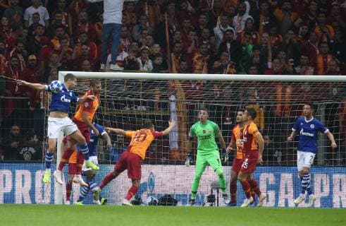 Goalkeeper Fernando Muslera of Galatasaray and Matija Nastasic , Mark Uth of FC Schalke 04 during the UEFA Champions League Group D match between Galatasaray and FC Schalke 04 at Turk Telekom Stadium in Istanbul , Turkey on October 24 , 2018. 