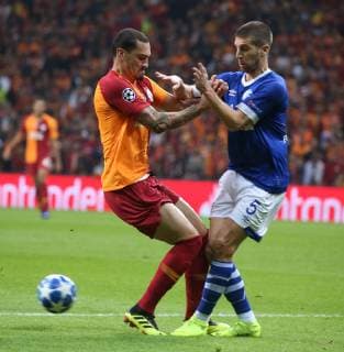 Maicon of Galatasaray and Matija Nastasic 5 of FC Schalke 04 during the UEFA Champions League Group D match between Galatasaray and FC Schalke 04 at Turk Telekom Stadium in Istanbul , Turkey on October 24 , 2018. 