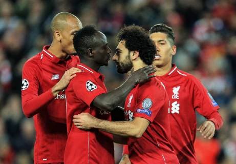 Liverpool s Mohamed Salah celebrates after scoring his teams third goal during the UEFA Champions League match at Anfield Stadium, Liverpool. Picture date 24th October 2018. Picture credit should read: Matt McNulty Sportimage EDITORIAL USE ONLY. No use with unauthorised audio, video, data, fixture lists, club league logos or live services. Online in-match use limited to 120 images, no video emulation. No use in betting, games or single club league player publications.