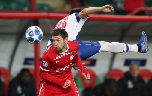 MOSCOW, RUSSIA â€“ OCTOBER 24, 2018: FC Lokomotiv Moscowâ€™s Grzegorz Krychowiak (L) and FC Portoâ€™s Hector Herrera in their 2018 19 UEFA Champions League Group D Round 3 football match against at RZD Arena Stadium. Sergei Savostyanov TASS  TS09514E