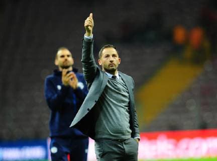 FC Schalke 04 coach Domenico Tedesco celebrates with fans after the UEFA Champions League Group D match between Galatasaray and FC Schalke 04 at Turk Telekom Stadium in Istanbul , Turkey on October 24 , 2018. 