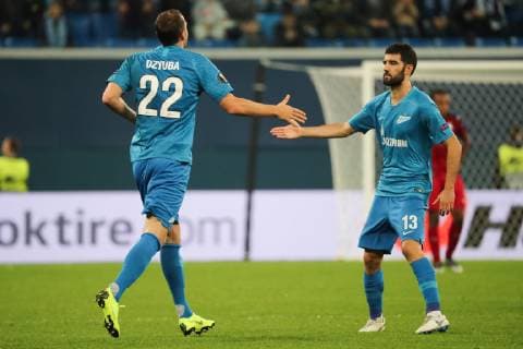 ST PETERSBURG, RUSSIA â€“ OCTOBER 25, 2018: Zenit St Petersburg s Artyom Dzyuba (L) and Luis Neto celebrate scoring in their 2018 19 UEFA Europa League Group C Round 3 football match against FC Bordeaux at Saint Petersburg Stadium. Alexander Demianchuk TASS  TS0953AF