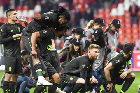 Standard s Christian Luyindama Nekadio and Standard s Gojko Cimirot celebrate after winning the match between Belgian soccer team Standard de Liege and Russian team Krasnodar in Liege, Thursday 25 October 2018, on the third day of the UEFA Europa League group stage, in group J. LAURIExDIEFFEMBACQ  x05455456x