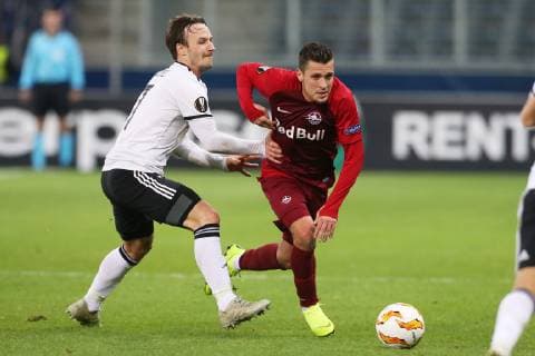 SOCCER - UEFA EL, RBS vs Rosenborg SALZBURG,AUSTRIA,25.OCT.18 - SOCCER - UEFA Europa League, group stage, Red Bull Salzburg vs Rosenborg BK. Image shows Mike Lindemann Jensen (Rosenborg) and Zlatko Junuzovic (RBS). GEPAxpictures xMathiasxMandl
