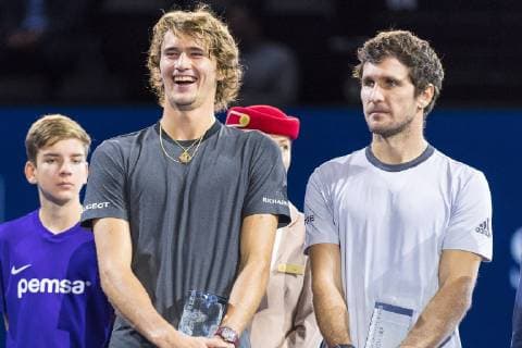 28th October 2018, St Jakobshalle, Basel, Switzerland; ATP Tennis Herren World Tour, Swiss Indoor Tennis; Alexander Zverev and Mischa Zverev receive the runners-up trophy after the doubles final  ActionPlus12074386 DavidxEmm