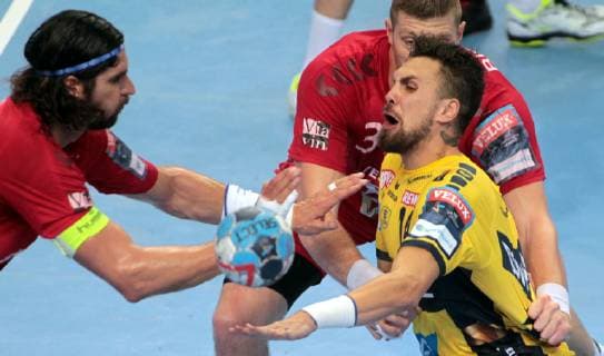 03.11.2018 Veszprem(Hungary) Telekom Veszprem-Rhein-Neckar Löwen EHF Champions League men s handball Bogdan Radivojevic(C) Rhein-Neckar Löwen stopped from Blaz Blagotinskek(behind),Laszlo Nagy(L) Telekom Veszprem : 
