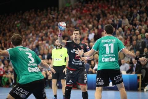 SG Flensburg Handewitt vs Skjern Handbold Handball EHF Champions League Group Phase 04 11 18 Rasmus Lauge Schmidt SG Flensburg Handewitt 25 against Jonathan Stenbaecken Skjern Handbold 11 and Benjamin Jakobsen Skjern Handbold 03 xmmkx