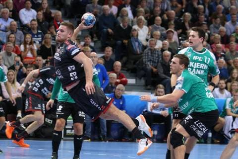 SG Flensburg Handewitt vs Skjern Handbold Handball EHF Champions League Group Phase 04 11 18 Johannes Golla SG Flensburg Handewitt 04 wins against Benjamin Jakobsen Skjern Handbold 03 and Jonathan Stenbaecken Skjern Handbold 11 xmmkx
