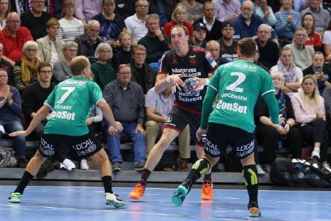 SG Flensburg Handewitt vs Skjern Handbold Handball EHF Champions League Group Phase 04 11 18 Holger Glandorf SG Flensburg Handewitt 09 against Thomas Mogensen Skjern Handbold 02 and Anders Eggert Skjern Handbold 07 xmmkx