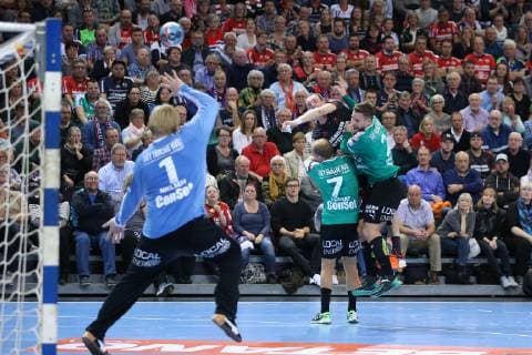 SG Flensburg Handewitt vs Skjern Handbold Handball EHF Champions League Group Phase 04 11 18 Holger Glandorf SG Flensburg Handewitt 09 against Thomas Mogensen Skjern Handbold 02 and Anders Eggert Skjern Handbold 07 xmmkx