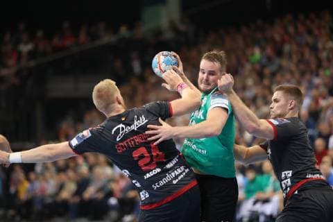 SG Flensburg Handewitt vs Skjern Handbold Handball EHF Champions League Group Phase 04 11 18 Jesper Konradsson Skjern Handbold 10 against Jim Gottfridsson SG Flensburg Handewitt 24 and Johannes Golla SG Flensburg Handewitt 04 xmmkx