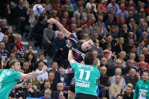 Rasmus Lauge Schmidt SG Flensburg Handewitt 25 against Jonathan Stenbaecken Skjern Handbold 11 Flensburg Schleswig Holstein Germany Flens Arena Copyright: xAgentur54Gradx xSpeedphotosx