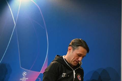 Niko KOVAC coach Bayern Muenchen leaves the stage with his head lowered FC Bayern Muenchen steps down from press conference before the Champions League match against AEK Athens Football on 06 11 2018