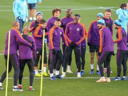 Manchester City Training Vincent Kompany manhandles Fabian Delph to run the gauntlet of Sergio Aguero, and team mates during the Manchester City training session at City Football Academy , Manchester Content Not Available For UK Newspapers Copyright: xStevexMcCormickx FIL-12508-0008