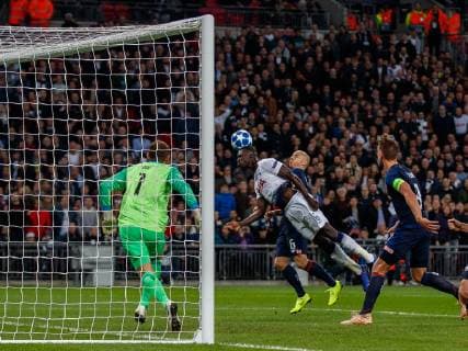 Football - 2017 2018 UEFA Champions League - Group B: Tottenham Hotspur vs. PSV Eindhoven Davinson Sanchez (Tottenham FC) at full stretch desperate to reach the cross with his head at Wembley Stadium. COLORSPORT DANIEL BEARHAM  csp_tot_psv_061118_