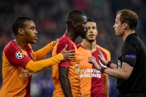 Gelsenkirchen Germany 06 11 2018 UEFA Champions League 2018 19 Season Back Round Group Phase Group D 4 Matchday FC Schalke 04 Galatasaray Istanbul Papa Alioune Ndiaye Galatasaray Istanbul and William Collum ref Garry Rodrigues Galatasaray Istanbul DeFodi520