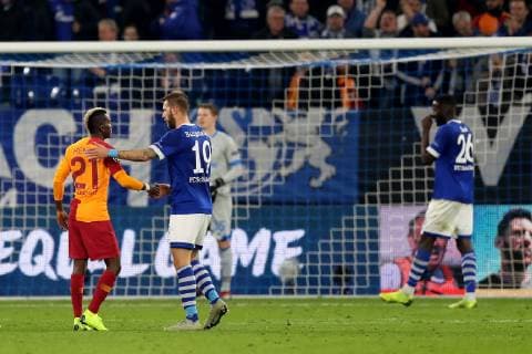 Henry Onyekuru Galatasaray Istanbul and Guido Burgstaller FC Schalke 04 after the Champions League match 2018 season 19 FC Schalke 04 Galatasaray Istanbul Copyright Thomas Pakusch Copyright: Thomas Pakusch