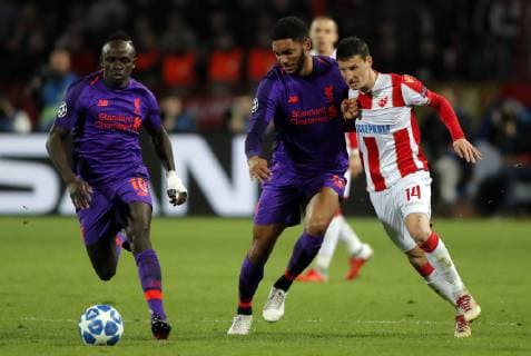 (181107) -- BELGRADE, Nov. 7, 2018 -- Liverpool s Sadio Mane (L) and Joe Gomez (C) vies with Crvena Zvezda s Slavoljub Srnic during UEFA Champions League group C football match between Crvena Zvezda and Liverpool in Belgrade, Serbia on Nov. 6, 2018. Crvena Zvezda won 2-0. ) (SP)SERBIA-BELGRADE-FOOTBALL-UEFA-CRVENA ZVEZDA VS LIVERPOOL PredragxMilosavljevic 
