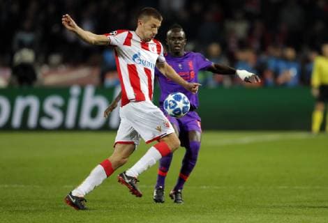 (181107) -- BELGRADE, Nov. 7, 2018 -- Crvena Zvezda s Dusan Jovancic (L) vies with Liverpool s Sadio Mane during UEFA Champions League group C football match between Crvena Zvezda and Liverpool in Belgrade, Serbia on Nov. 6, 2018. Crvena Zvezda won 2-0. ) (SP)SERBIA-BELGRADE-FOOTBALL-UEFA-CRVENA ZVEZDA VS LIVERPOOL PredragxMilosavljevic 