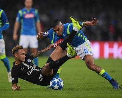 (181107) -- NAPLES, Nov. 7, 2018 (Xinhua) -- Paris Saint-Germain s Neymar (L) vies with Napoli s Allan during the UEFA Champions League Group C match between Napoli and PSG in Naples, Italy, Nov. 6, 2018. The match tied 1-1. (Xinhua Alberto Lingria) (SP)ITALY-NAPLES-SOCCER-UEFA CHAMPIONS LEAGUE-NAPOLI VS PSG 