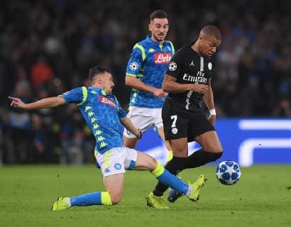 (181107) -- NAPLES, Nov. 7, 2018 (Xinhua) -- Paris Saint-Germain s Kylian Mbappe (R) vies with Napoli s Mario Rui (L) during the UEFA Champions League Group C match between Napoli and PSG in Naples, Italy, Nov. 6, 2018. The match tied 1-1. (Xinhua Alberto Lingria) (SP)ITALY-NAPLES-SOCCER-UEFA CHAMPIONS LEAGUE-NAPOLI VS PSG 