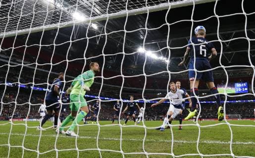 (181107) -- LONDON, Nov. 7, 2018 (Xinhua) -- Eindhoven s Angelino (1st R) heads for the ball during the UEFA Champions League match between Tottenham Hotspur and PSV Eindhoven in London, Britain on Nov. 6, 2018. Tottenham Hotspur won 2-1. (Xinhua Han Yan) FOR EDITORIAL USE ONLY. NOT FOR SALE FOR MARKETING OR ADVERTISING CAMPAIGNS. NO USE WITH UNAUTHORIZED AUDIO, VIDEO, DATA, FIXTURE LISTS, CLUB LEAGUE LOGOS OR LIVE SERVICES. ONLINE IN-MATCH USE LIMITED TO 45 IMAGES, NO VIDEO EMULATION. NO USE IN BETTING, GAMES OR SINGLE CLUB LEAGUE PLAYER PUBLICATIONS. (SP) BRITAIN-LONDON-FOOTBALL-CHAMPIONS LEAGUE-HOTSPUR VS EINDHOVEN