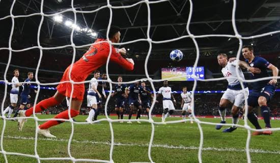 (181107) -- LONDON, Nov. 7, 2018 (Xinhua) -- Tottenham Hotspur s goalkeeper Paulo Gazzaniga (L, front) saves the ball during the UEFA Champions League match between Tottenham Hotspur and PSV Eindhoven in London, Britain on Nov. 6, 2018. Tottenham Hotspur won 2-1. (Xinhua Han Yan) FOR EDITORIAL USE ONLY. NOT FOR SALE FOR MARKETING OR ADVERTISING CAMPAIGNS. NO USE WITH UNAUTHORIZED AUDIO, VIDEO, DATA, FIXTURE LISTS, CLUB LEAGUE LOGOS OR LIVE SERVICES. ONLINE IN-MATCH USE LIMITED TO 45 IMAGES, NO VIDEO EMULATION. NO USE IN BETTING, GAMES OR SINGLE CLUB LEAGUE PLAYER PUBLICATIONS. (SP) BRITAIN-LONDON-FOOTBALL-CHAMPIONS LEAGUE-HOTSPUR VS EINDHOVEN