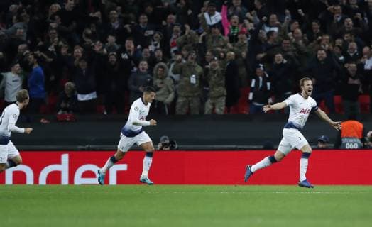(181107) -- LONDON, Nov. 7, 2018 (Xinhua) -- Tottenham Hotspur s Harry Kane (R) celebrates after scoring the winning goal during the UEFA Champions League match between Tottenham Hotspur and PSV Eindhoven in London, Britain on Nov. 6, 2018. Tottenham Hotspur won 2-1. (Xinhua Han Yan) FOR EDITORIAL USE ONLY. NOT FOR SALE FOR MARKETING OR ADVERTISING CAMPAIGNS. NO USE WITH UNAUTHORIZED AUDIO, VIDEO, DATA, FIXTURE LISTS, CLUB LEAGUE LOGOS OR LIVE SERVICES. ONLINE IN-MATCH USE LIMITED TO 45 IMAGES, NO VIDEO EMULATION. NO USE IN BETTING, GAMES OR SINGLE CLUB LEAGUE PLAYER PUBLICATIONS. (SP) BRITAIN-LONDON-FOOTBALL-CHAMPIONS LEAGUE-HOTSPUR VS EINDHOVEN