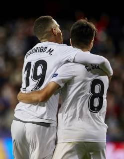 7th November 2018, Mestalla Stadium, Valencia, Spain; UEFA Champions League football, Valencia versus Young Boys; Rodrigo Moreno and Carlos Soler of Valencia CF celebrate the first goal for their team in minute 14  ActionPlus12077038 IvanxArlandis