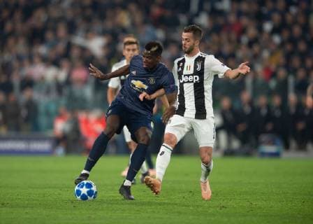Juventus v Manchester United ManU UEFA Champions League Paul Pogba of Manchester United (left) gets to the ball ahead of Miralem Pjanic of Juventus during the UEFA Champions League match at Juventus Stadium, Turin Content Not Available For UK Newspapers Copyright: xRussellxHartx FIL-12512-0012