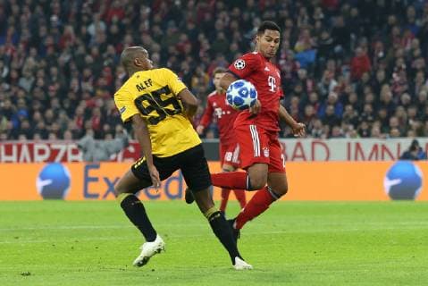 l r in duel action with Alef 95 AEK Athens and Serge Gnabry 22 FC Bayern Munich FC Bayern Munich vs. AEK Athens Soccer Preliminary Round Champions League 07 11 2018 Munich Bayern Germany Copyright: xkolbert-press ChristianxKolbertx