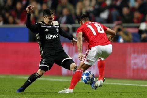 (l-r) Nico Tagliafico of Ajax, Eduardo Salvio of SL Benfica during the UEFA Champions League group E match between SL Benfica and Ajax Amsterdam at Estadio La Luz on November 97, 2018 in Lisbon, Portugal UEFA Champions League 2018 2019 xVIxVIxImagesx xMauricexvanxSteenxIVx 12704011
