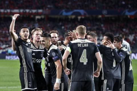 LISSABON, Estadio da Luz, 07-11-2018, football, season 2018 2019, Football Champions League . Ajax midfielder Noussair Mazraoui (L) Ajax defender Nico Tagliafico (C) and Ajax defender Matthijs de Ligt (R) celebrating the 1-1 during the game Benfica - Ajax . Benfica - Ajax  x2604489x