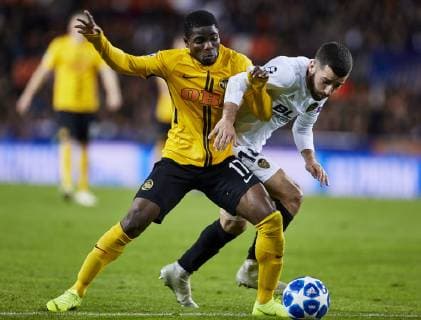 7th November 2018, Mestalla Stadium, Valencia, Spain; UEFA Champions League football, Valencia versus Young Boys; Roger Assale of Young Boys tussles for the ball with Defender Jose Gaya of Valencia CF  ActionPlus12077124 IvanxArlandis