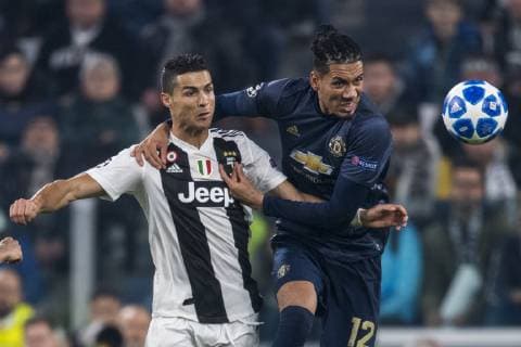 Chris Lloyd Smalling (Manchester Utd) Cristiano Ronaldo dos Santos Aveiro (Juventus) during the Uefa Champions League Group Stage H, match between Juventus 1-2 Manchester Utd at Allianz Stadium on November 07, 2018 in Torino, Italy. Noxthirdxpartyxsales  (90665270)