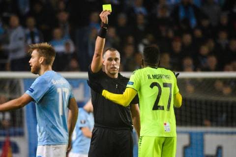 181108 Goalkeeper Aleksandr Vasyutin of Sarpsborg 08 revives a warning during the Europa League group stage match between Malmö FF and Sarpsborg 08 on November 8, 2018 in Malmö.  Copyright: LUDVIGxTHUNMAN BB181108LT020