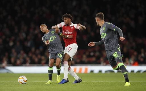 Alex Iwobi of Arsenal tussles with Rodrigo Battaglia of Sporting Lisbon during the Europa League, Group E match at the Emirates Stadium, London. Picture date: 8th November 2018. Picture credit should read: David Klein Sportimage EDITORIAL USE ONLY. No use with unauthorised audio, video, data, fixture lists, club league logos or live services. Online in-match use limited to 120 images, no video emulation. No use in betting, games or single club league player publications.