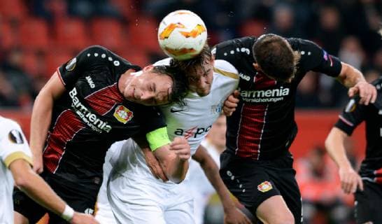 Football UEFA Europa League Men Season 2018 2019 Group A 4 Matchday BayArena Leverkusen Bayer Leverkusen black FC Zurich white Julian Baumgartlinger LEV Andreas Maxso FCZ Lucas Alario LEV Action UEFA REGULATIONS PROHIBIT ANY USE OF PHOTOGRAPHS AS IMAGE SEQUENCES AND OR QUASI VIDEO