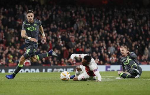 Jeremy Mathieu of Sporting Lisbon (r) brings down Pierre-Emerick Aubameyang of Arsenal during the Europa League, Group E match at the Emirates Stadium, London. Picture date: 8th November 2018. Picture credit should read: David Klein Sportimage EDITORIAL USE ONLY. No use with unauthorised audio, video, data, fixture lists, club league logos or live services. Online in-match use limited to 120 images, no video emulation. No use in betting, games or single club league player publications.