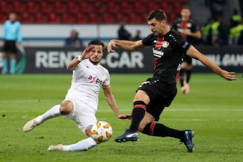 (181109) -- LEVERKUSEN, Nov. 9, 2018 -- Zurich s Antonio Marchesano (L) vies with Leverkusen s Aleksander Dragovic during the UEFA Europa League football group match between Bayer 04 Leverkusen and FC Zurich in Leverkusen, Germany, on Nov. 8, 2018. Leverkusen won 1-0. ) (SP)GERMANY-LEVERKUSEN-SOCCER-UEFA EUROPA LEAGUE-LEVERKUSEN VS ZURICH JoachimxBywaletz 