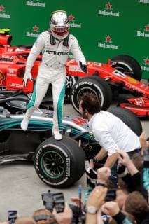 British driver Lewis Hamilton of Mercedes celebrates after the Brazilian Grand Prix, in Sao Paulo, Brazil, 11 November 2018. Hamilton (Mercedes), five times champion of the world, won on Sunday the Brazilian Grand Prix, the penultimate round of the Formula One World Championship WM Weltmeisterschaft which took place at the Interlagos circuit in Sao Paulo, where his team mathematically secured its fifth World Cup followed of builders. Hamilton achieved his 72nd victory in F1 by winning ahead of Dutch Max Verstappen (Red Bull) and Finnish Kimi Raikkonen (Ferrari). Formula One Grand Prix of Brazil !ACHTUNG: NUR REDAKTIONELLE NUTZUNG!  Copyright: xSebastiaoxMoreirax AME2432 20181111-636775646645726693