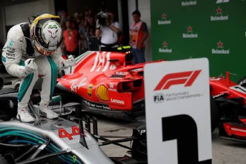 British driver Lewis Hamilton of Mercedes celebrates after the Brazilian Grand Prix, in Sao Paulo, Brazil, 11 November 2018. Hamilton (Mercedes), five times champion of the world, won on Sunday the Brazilian Grand Prix, the penultimate round of the Formula One World Championship WM Weltmeisterschaft which took place at the Interlagos circuit in Sao Paulo, where his team mathematically secured its fifth World Cup followed of builders. Hamilton achieved his 72nd victory in F1 by winning ahead of Dutch Max Verstappen (Red Bull) and Finnish Kimi Raikkonen (Ferrari). Formula One Grand Prix of Brazil !ACHTUNG: NUR REDAKTIONELLE NUTZUNG!  Copyright: xFernandoxBizerrax AME2487 20181111-636775679282939424
